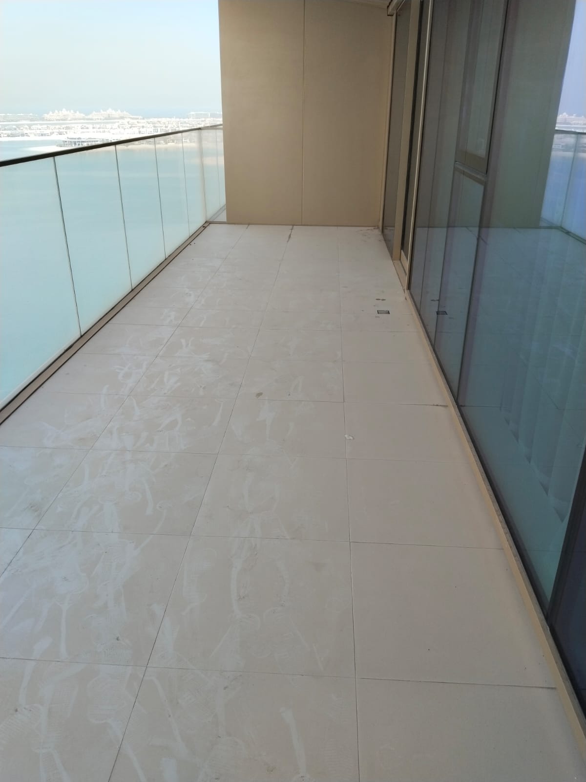 Balcony before professional deep cleaning with visible dust and buildup